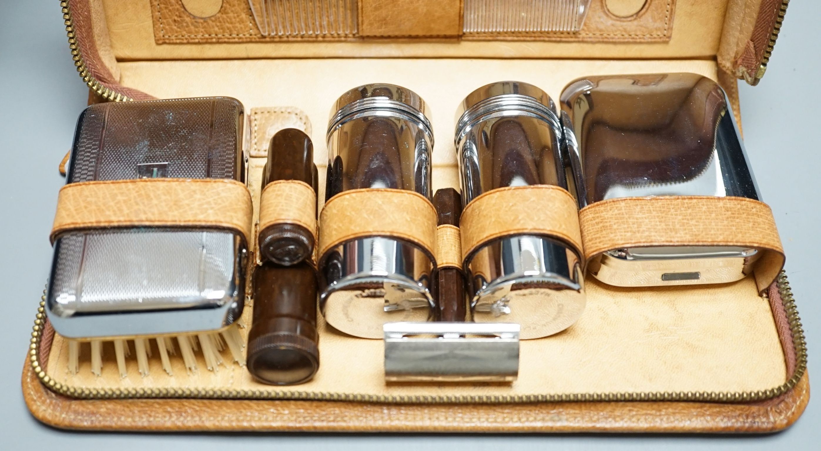 A leather cased gentleman's vanity set